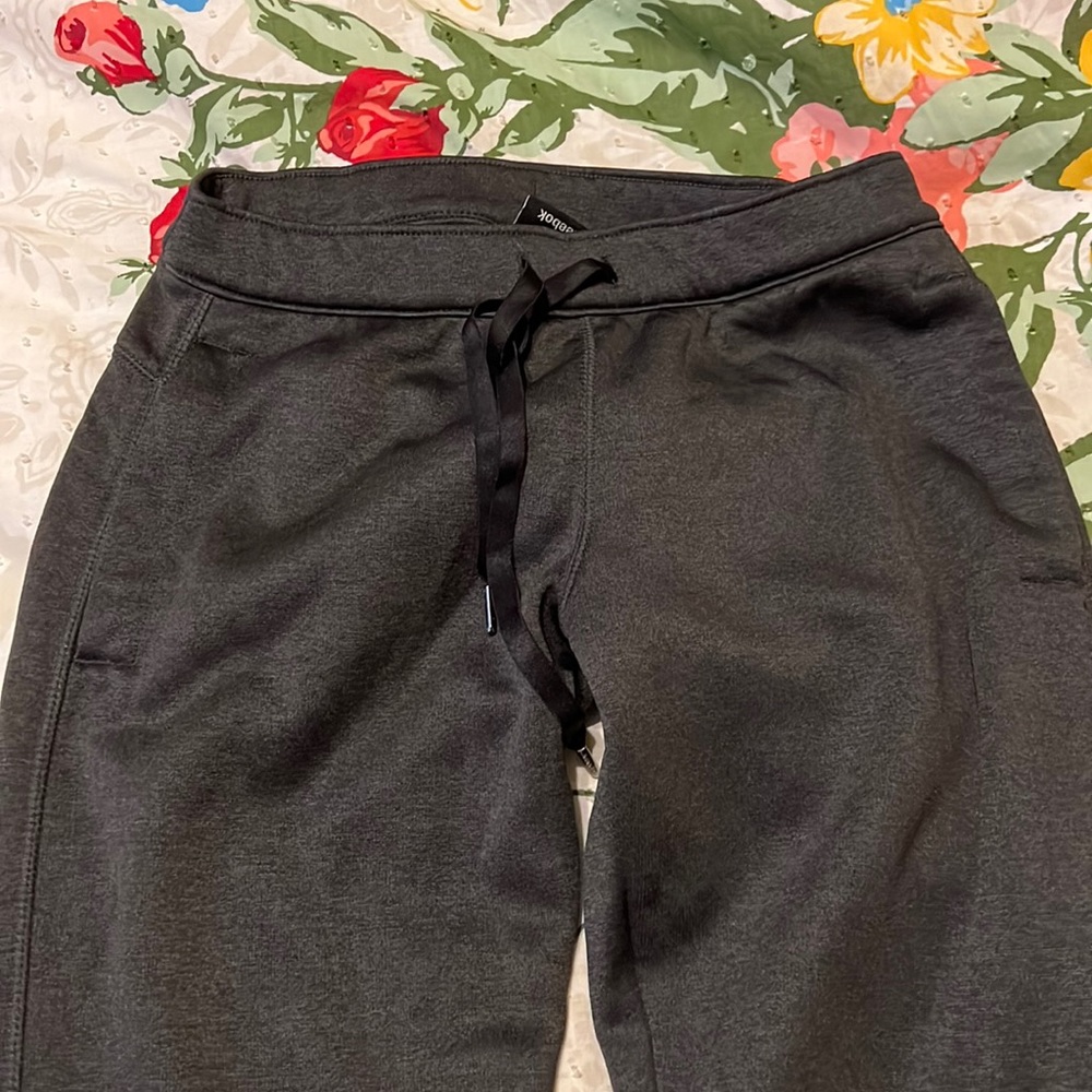 Reebok sweatpants.